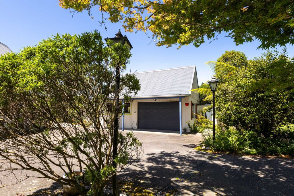 Kaniere house with new garage door